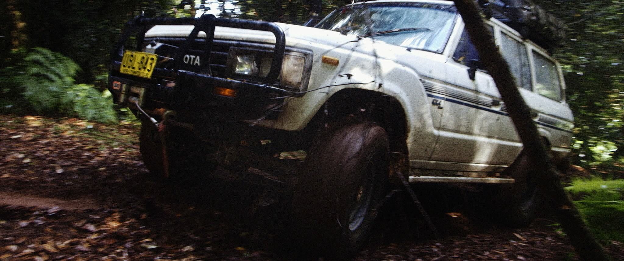 Abe’s trusty old 60 series Landcruiser makes mince of a muddy hill climb!